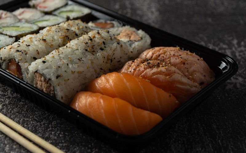 delicious-japanese-food-sushi-dark-marble-table-1-scaled